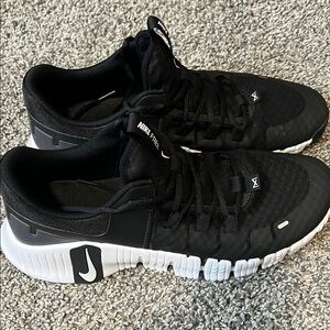 Nike Black and White Athletic Shoes with Flexible Design
